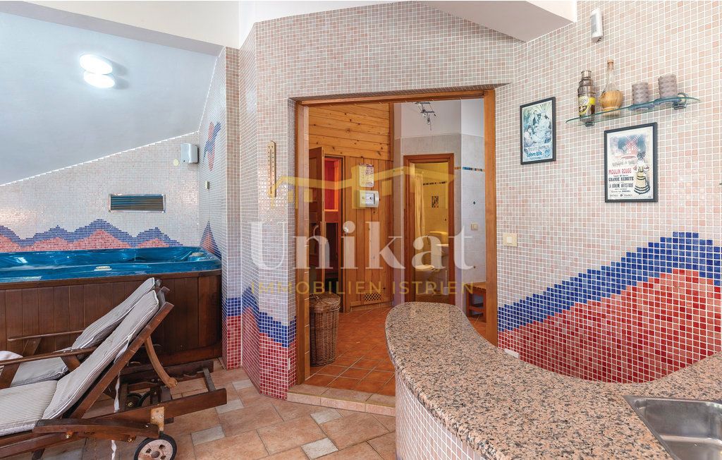 Enonadstropna hiša z wellness prostorom